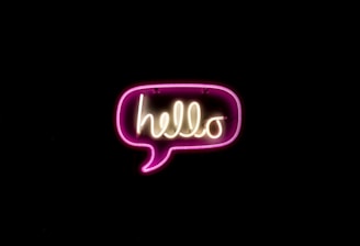 pink and yellow hello neon light